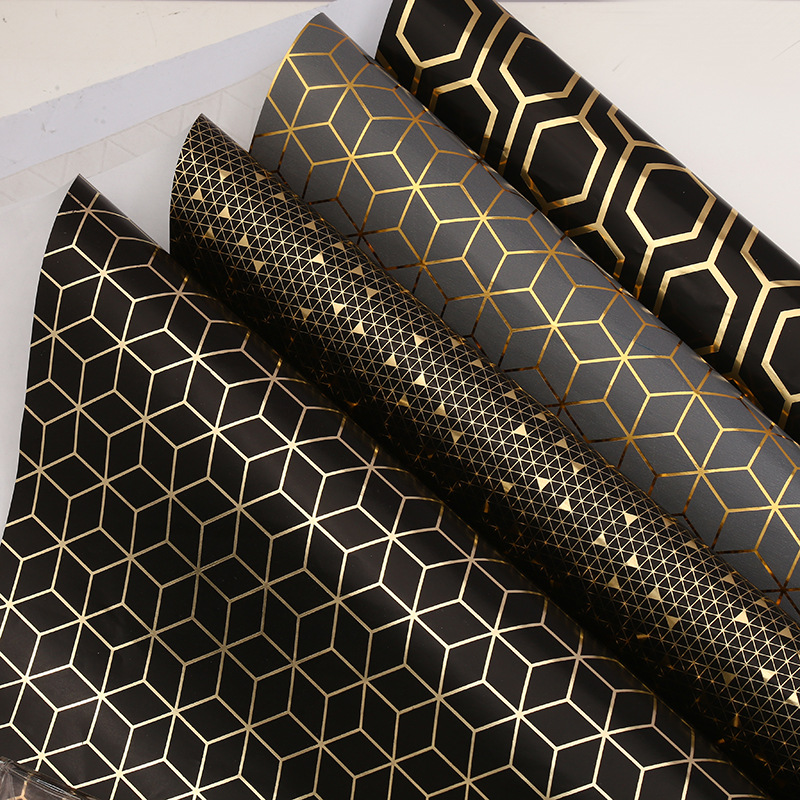 Papel de regalo serie geométrica dorado papel de embalaje engrosado papel recubierto caja de regalo de vacaciones embalaje papel de seda al por mayor