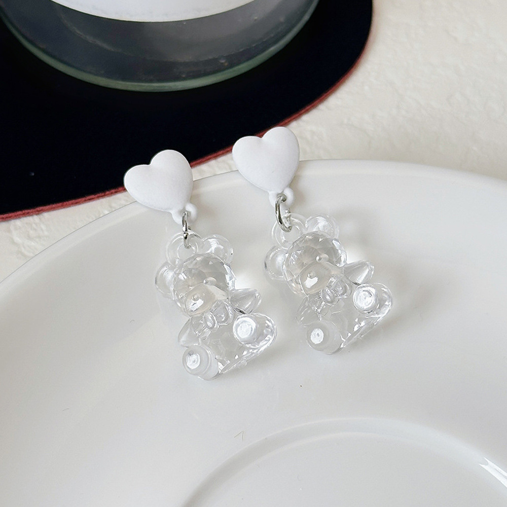 Aguja de plata de moda alta sensación de diamante de goteo de aceite pendientes nicho universal elegante pernos de orejas ligero lujoso temperamento simple orejas para mujeres