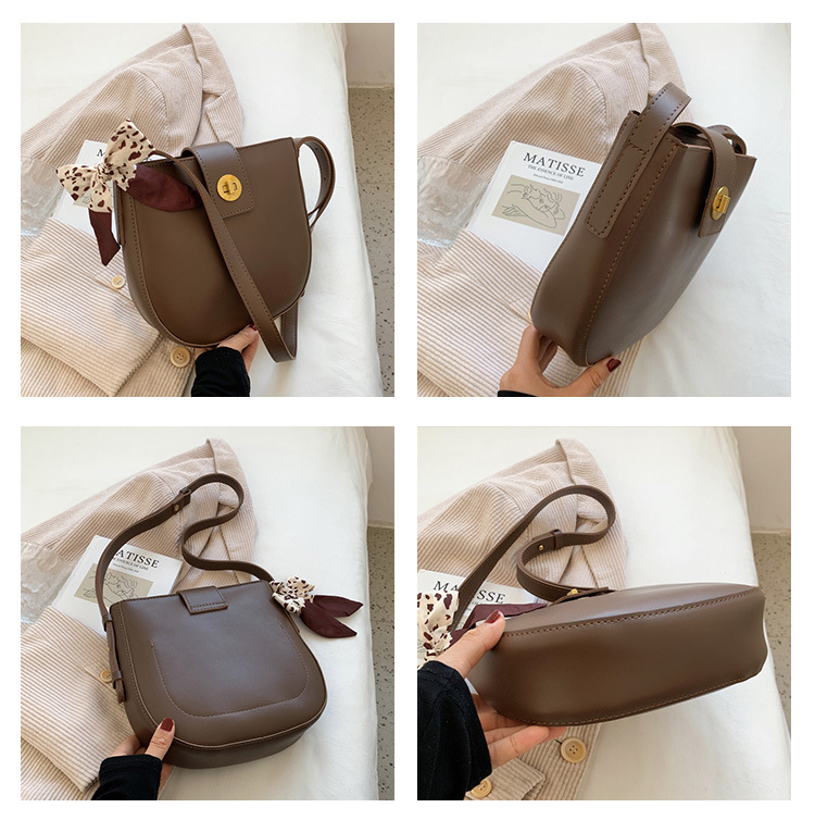 Retro Soft Leather Bucket Underarm Middle Bag Solid Color Saddle Bag display picture 1