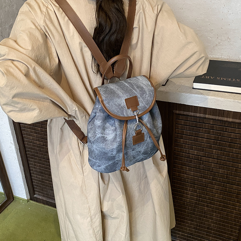 Gran capacidad de viento británico 2025, simple otoño nuevo estilo de textura casual de moda viaje viaje viaje mochila