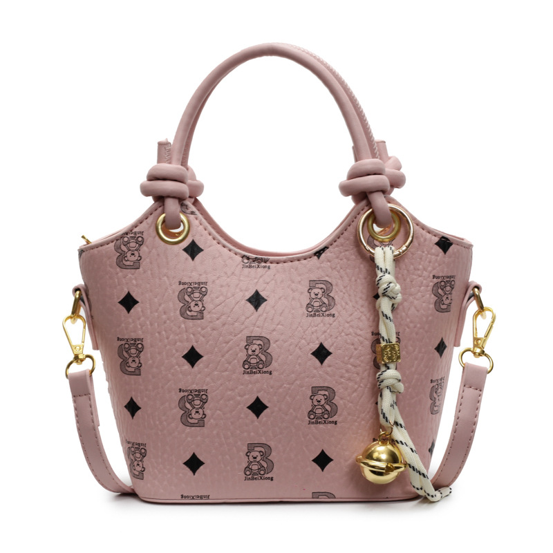 Tendencia impresa bolso de cubo de mano mujer 2025 nueva moda textura versátil bolso de hombro super caliente bolso de mochila