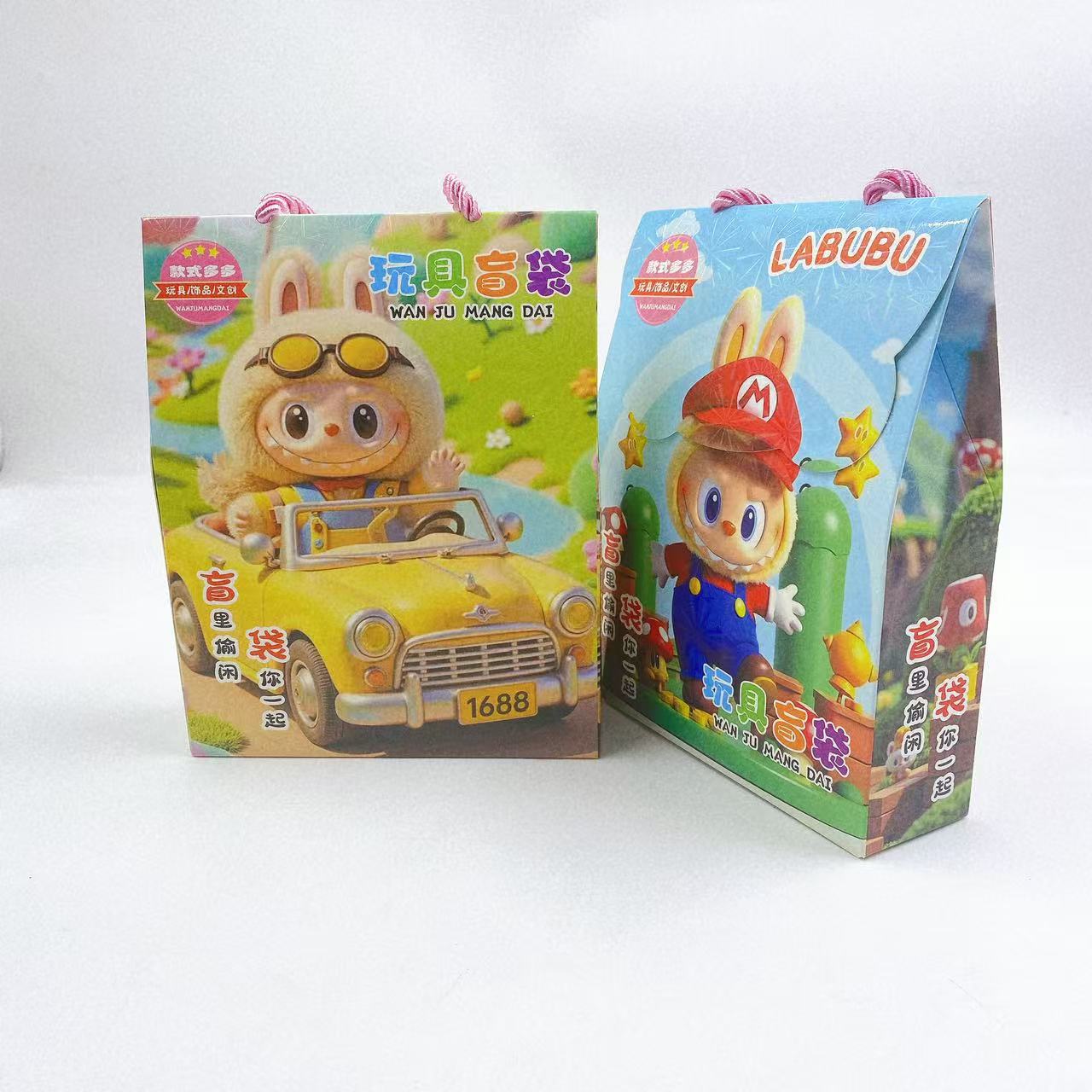 Juguetes infantiles de dibujos animados bolsas ciegas de mano nueva caja ciega bolsas de regalo papelería pegatinas regalo jardín de infantes premios al por mayor