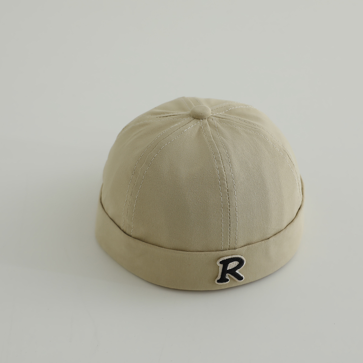 Primavera niños terratenientes sombreros hombres y mujeres letras de la marea sin bordes sombreros de piel de melón sombreros de calabaza sombreros de boina de personalidad