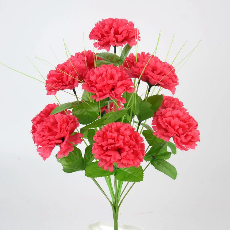 flores de seda colocadas en el cementerio del cementerio del cementerio de flores de 12 claves de fruta verde