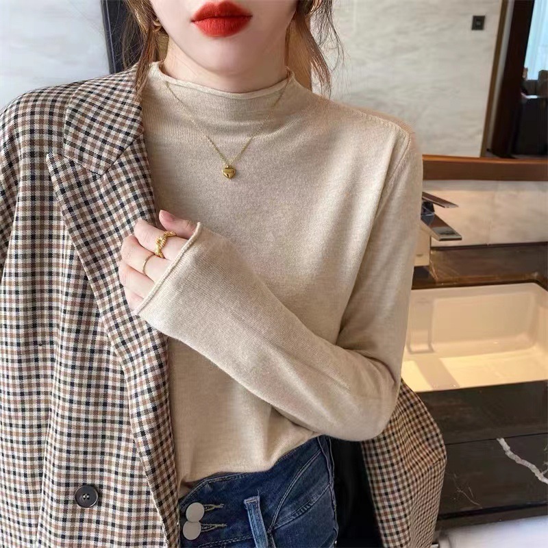 韓国版秋冬半高襟のニットの女性の薄いタイプの洋風の新型の中にセーターの長袖の上着を掛けて外に着ます。|undefined