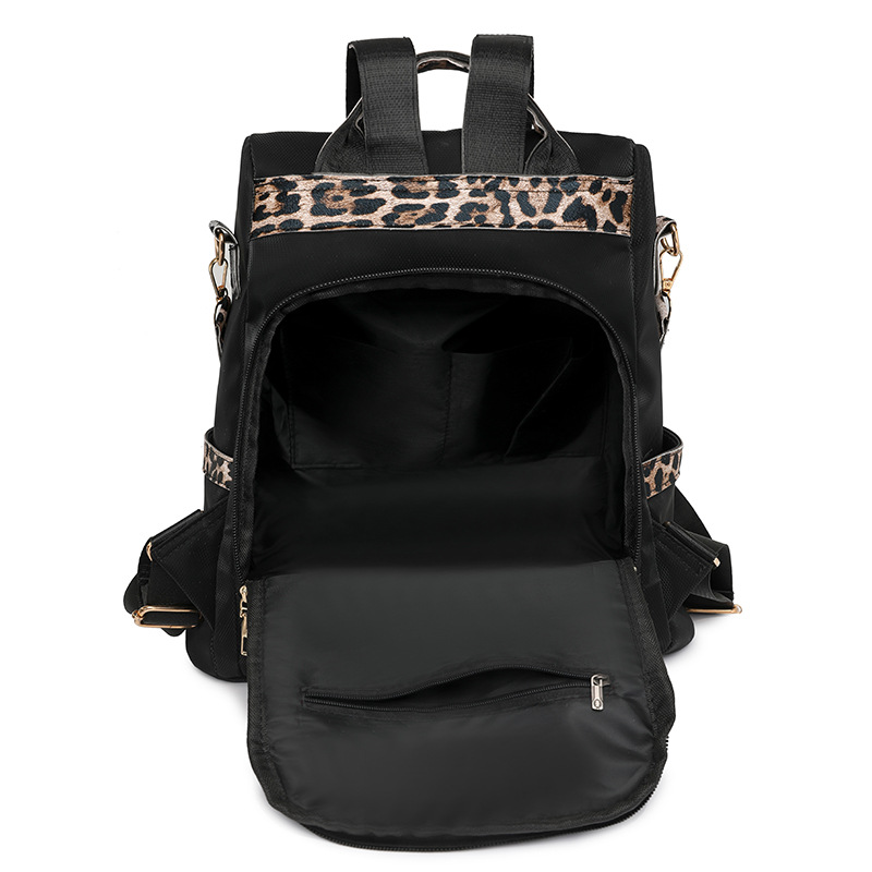 Spot wholesale 2025 nueva mochila antirrobo para mujer moda color de contraste mochila de nailon de viaje ligero bolso de doble uso