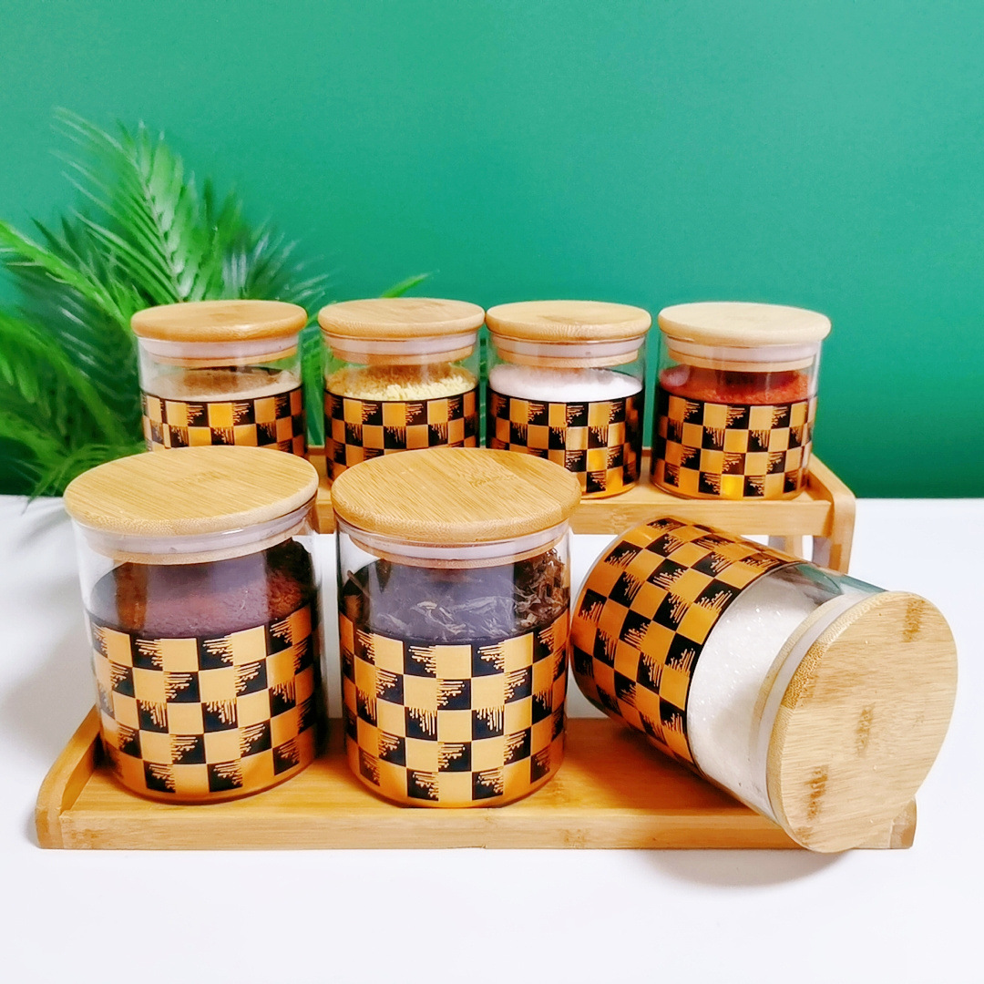 Fábrica directa transfronteriza dedicada para el Comercio exterior Exportación de vidrio cilíndrico sazonador tarro de almacenamiento