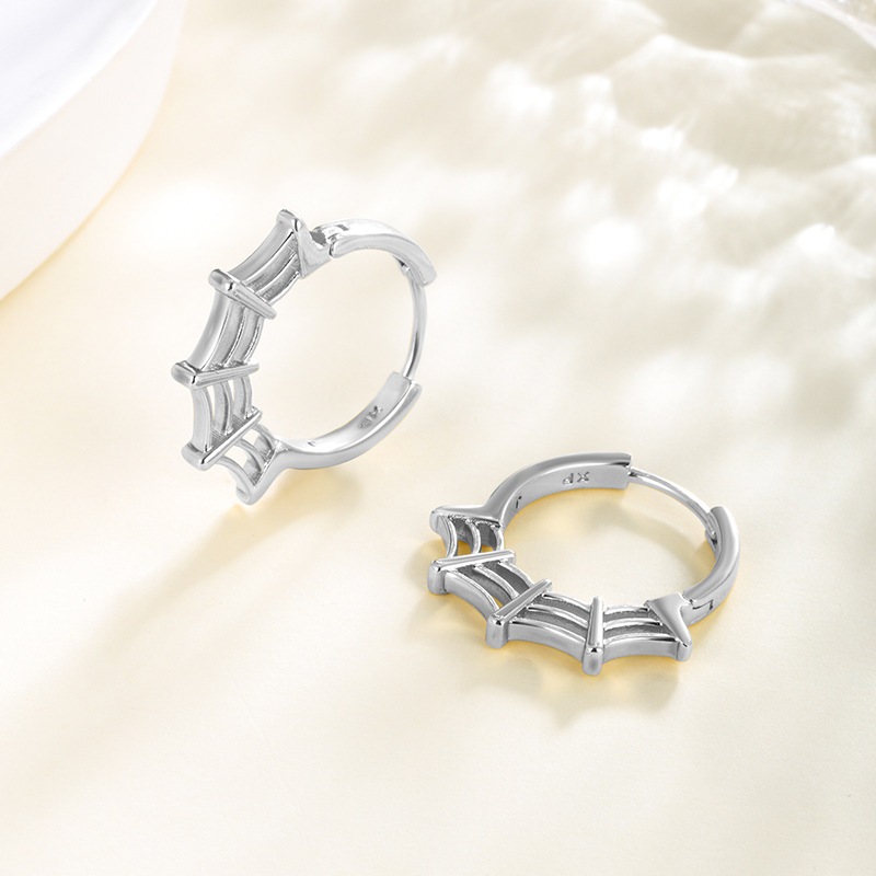 Joyería Xuping Amazon transfronteriza neutral fría aretes de aretes de tela de araña para hombres nicho de alta calidad para mujeres
