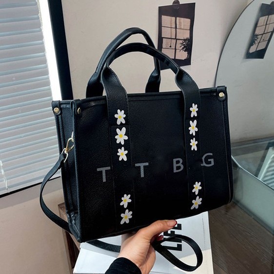 Bolsos de mujer portátiles de gran capacidad 2025 primavera y verano nueva moda todo-fósforo bolso de mensajero de alta calidad