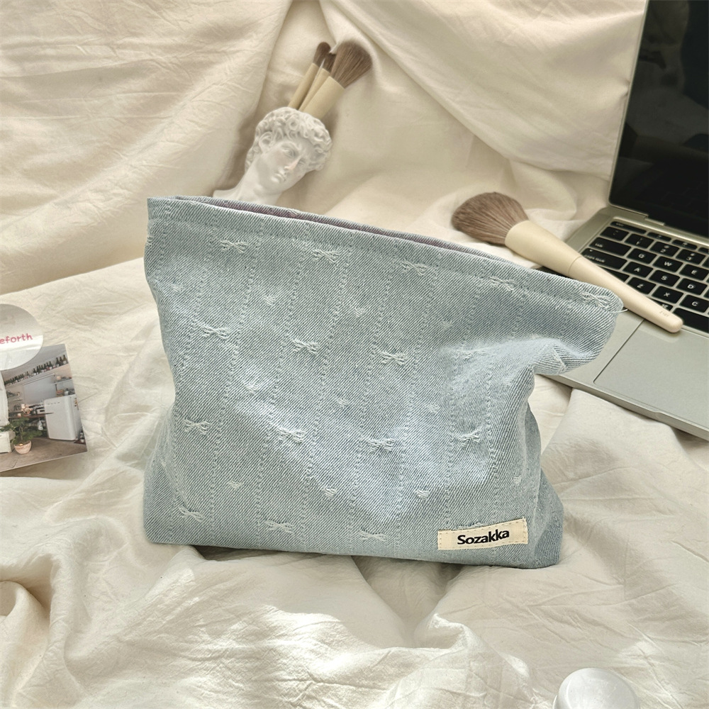 416g Weight Canvas Lining Material Zipper Closure Type / Strap Type Cosmetic Bag Bags Type Holiday, Travel, Daily Occasion Denim Material Bag, Cattle, Knot, Butterfly, Bow Knot Pattern All Seasons Season Women's Gender Cute Style Square Shape Cute Bag Cattle Knot Denim Square Makeup Bags 16