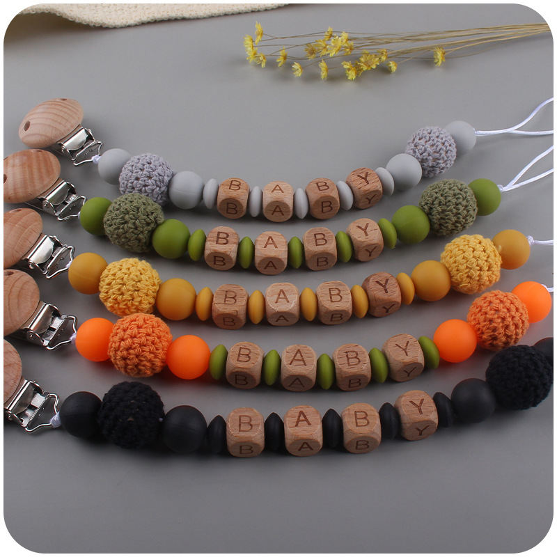 Bebé suministros de dibujos animados de haya animal pulsera de silicona DIY nombre calmante bebé molar juguete anti-caída de la cadena