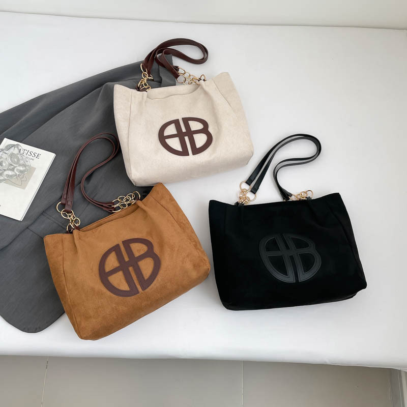 Gran capacidad retro 2025 nuevo estilo ocio simple de piel de ciervo viaje de moda ocio de hombro bolsa de mano para mujeres