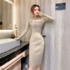 Hollowed out low chest mid length A-line long skirt knitted dress long sleeve dress