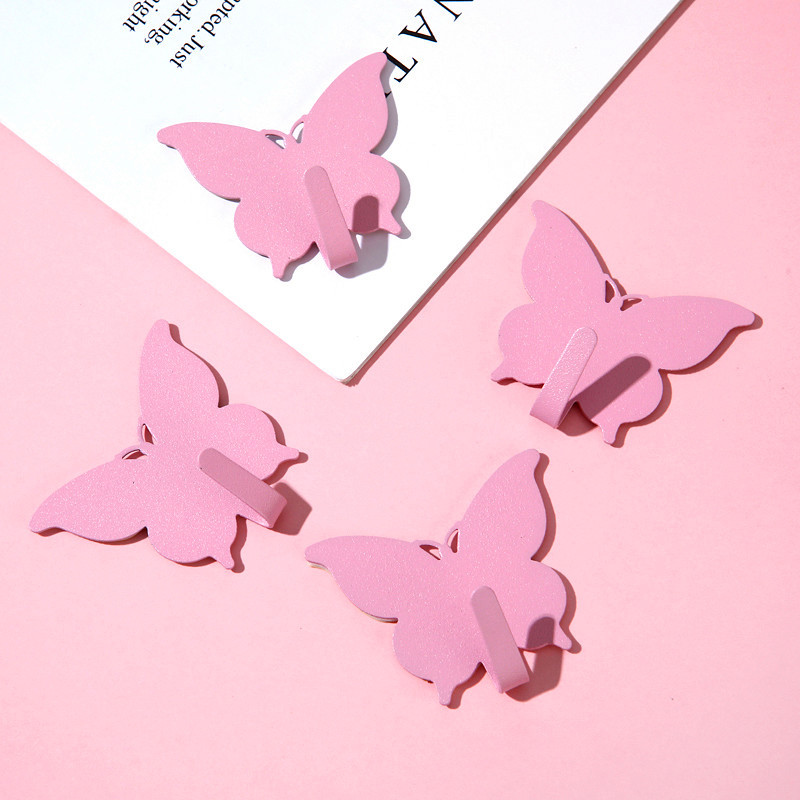 Gancho de mariposa fuerte sin agujeros ins viento encantador gancho adhesivo de corazón de niña decoración de pared de habitación gancho adhesivo de alto valor visual
