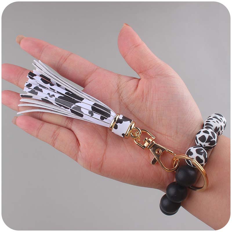 Nuevo cuero creativo pu corto borla colgante de silicona con cuentas muñeca llavero colgante pulsera llavero Accesorios
