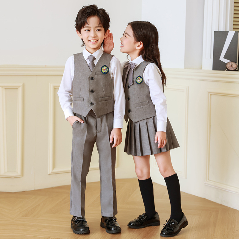 Ropa de jardín de infancia Primavera y otoño estilo británico traje vestido de primer grado ropa de cuatro piezas de escuela primaria uniforme traje