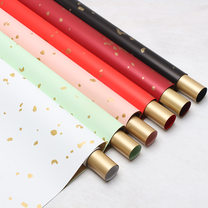 Flores de flores de papel de oro de oro de papel de embalaje de flores comercio exterior al por mayor materiales de flores impermeables floristas de paquetes de papel