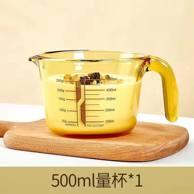 Taza de medición de vidrio espesado con escala mango ámbar horneado taza de agua taza de medición cuchara taza de medición de vidrio espesado mayorista taza de medición