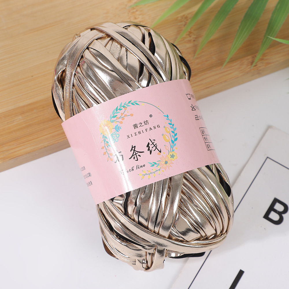 Línea textil Qian Zhi hilo de color mágico tejido a mano hilo de fantasía de color bricolaje en stock fábrica al por mayor