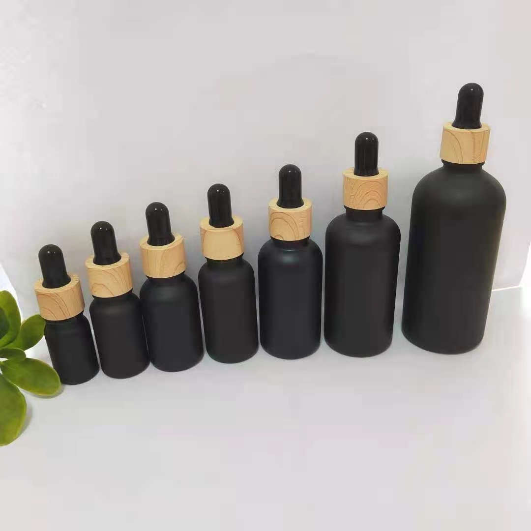 现货哑黑玻璃精油瓶蒙砂木纹圈滴管分装瓶喷乳便携式调配瓶香水