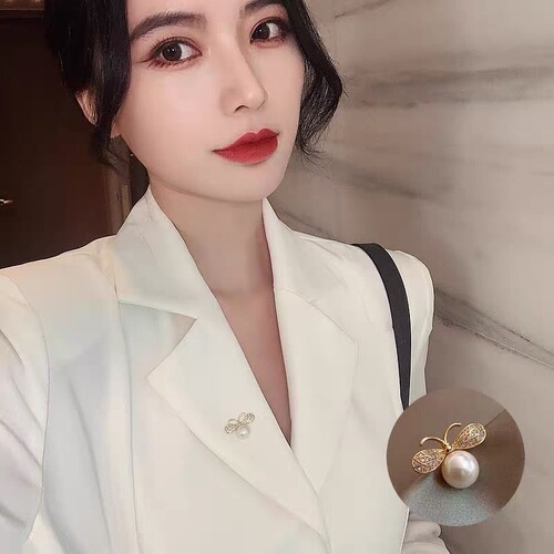Butterfly knot cat's eye stone brooch for women, cute Japanese style, anti-hiding fastener, Instagram trendy, personalized pin to fix clothes, accessory