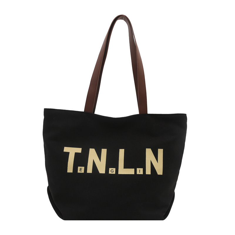 Bolsa de lona de gran capacidad para mujeres 2025, primavera y otoño, nueva literatura y moda, bolso de hombro, letras casuales, bolso de viaje