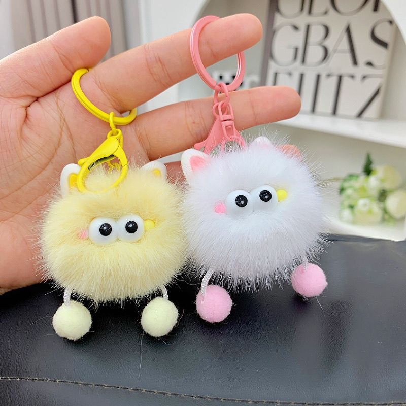 Suministro de nuevos lindos dibujos animados elfos de carbón pequeño colgante de pelusa colgante llavero de automóvil bolso colgante