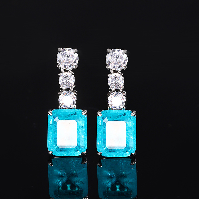 2024 Nueva joyería Zhuang Shengsheng, fondo de cobre, imitación de oro, tesoro de color, temperamento de corindón, pendientes simples, piedra principal femenina 10*12