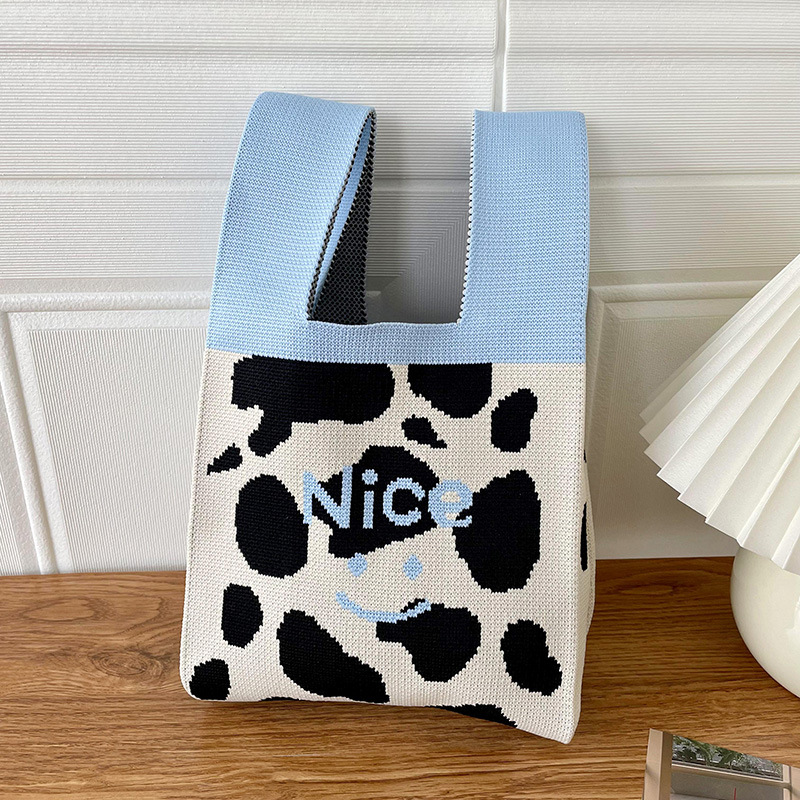 Bolsa de las mujeres de estilo coreano diseño de nicho lindo bolso de mano de punto de dibujos animados calle estudiante gran capacidad bolsa de las axilas