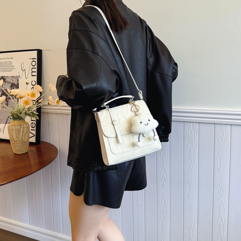 Mochila pequeña 2024 nuevo estilo de diseño de moda nicho de viaje bolsas escolares ligeras para mujeres ins para salir mochila pequeña