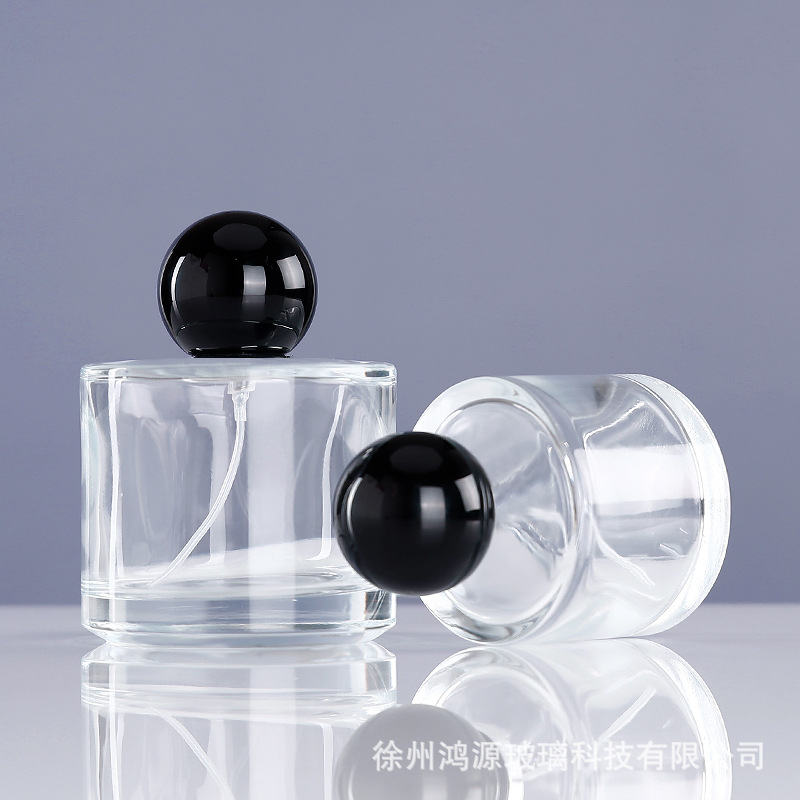Perfume fragancia sub-botella cilíndrica cubierta de la bola botella de spray de vidrio portátil de alta gama 50ml100ml Presione botella de muestra pequeña