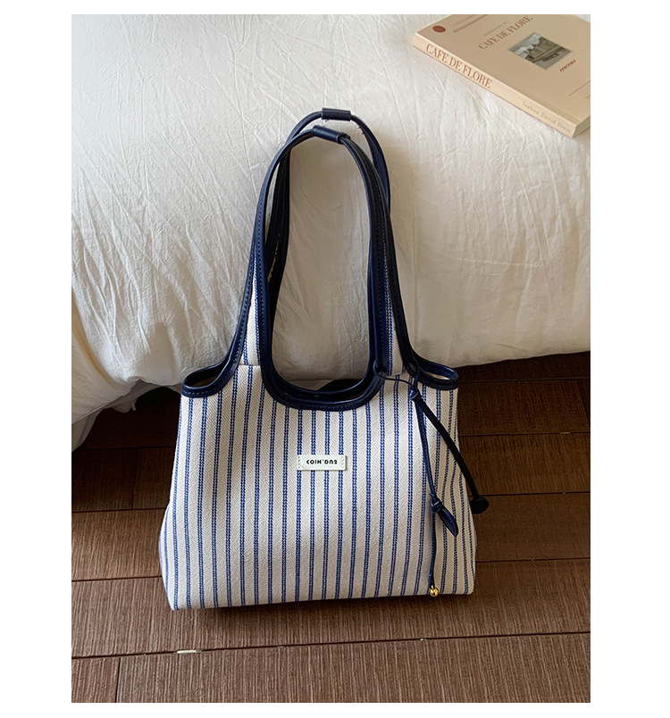 2025 Casual Commuter Tote bag, women's niche striped simple and fashionable hand-held shoulder bag, large-capacity underarm bag undefined