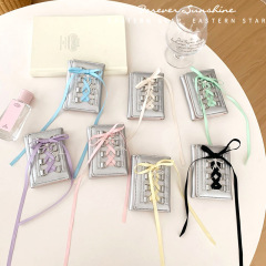 バレエ風のバンドの財布の女性の短い小銭入れのボタン式の3割引のPUカードのカバンの日はボタンの日韓の現物を含みます。