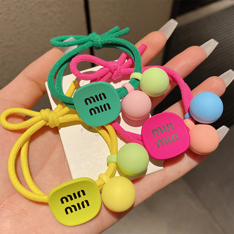 Coreano simple letra MIN anillo de cabello de niña bola cabeza cuerda de cola de caballo universal toque de cabello correa de cuero al por mayor