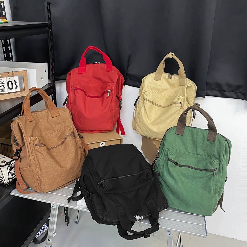 School bag for leisure, backpack, for students, Korean style, simple and elegant design, wholesale