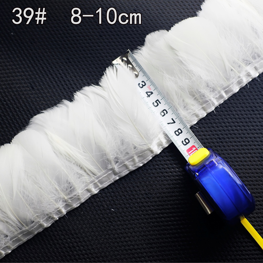 Colección de productos de plumas blancas al por mayor Accesorios de ropa de plumas hechos a mano de bricolaje Accesorios de plumas de ganso Material de plumas de pavo