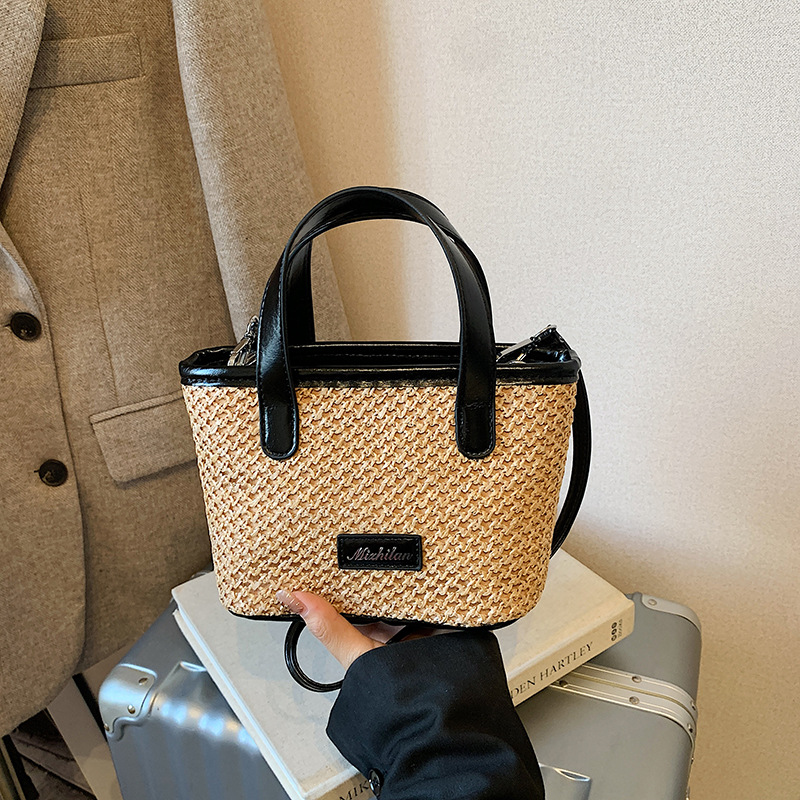 Bolsa de playa de moda coreana tejida, color extranjero, bolsa de hombro ligera y compacta para niños y niñas, nueva bolsa infantil transfronteriza.