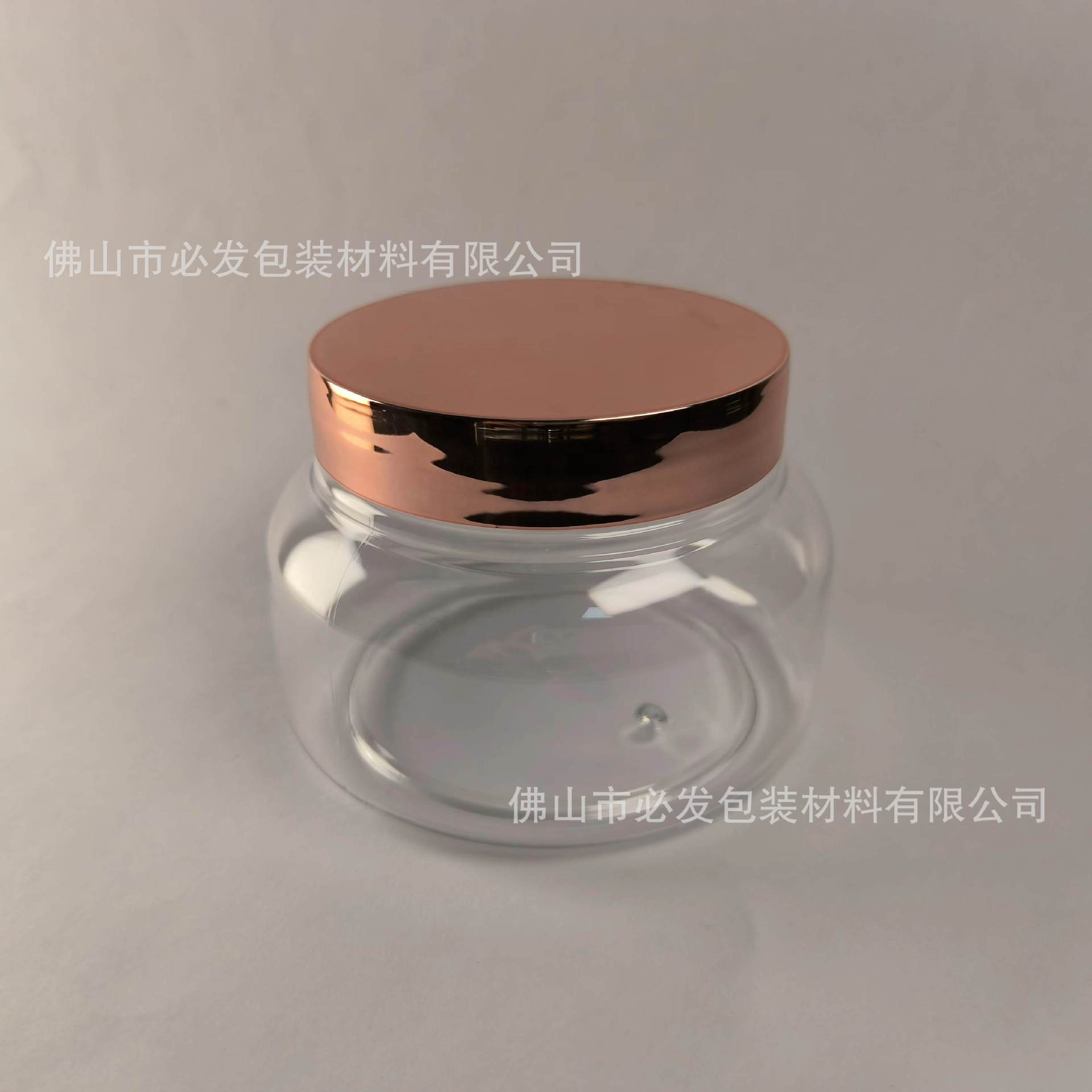 250g; Botella transparente de 250g + tapa chapada en oro rosa; PET