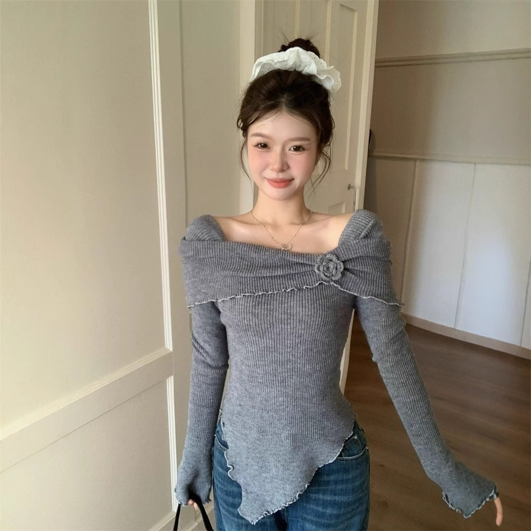 フランス風の気質の木の耳元の立体的な花の一字の肩のニットの上着の修身のセーターの底のシャツの女性は秋冬を掛けます。