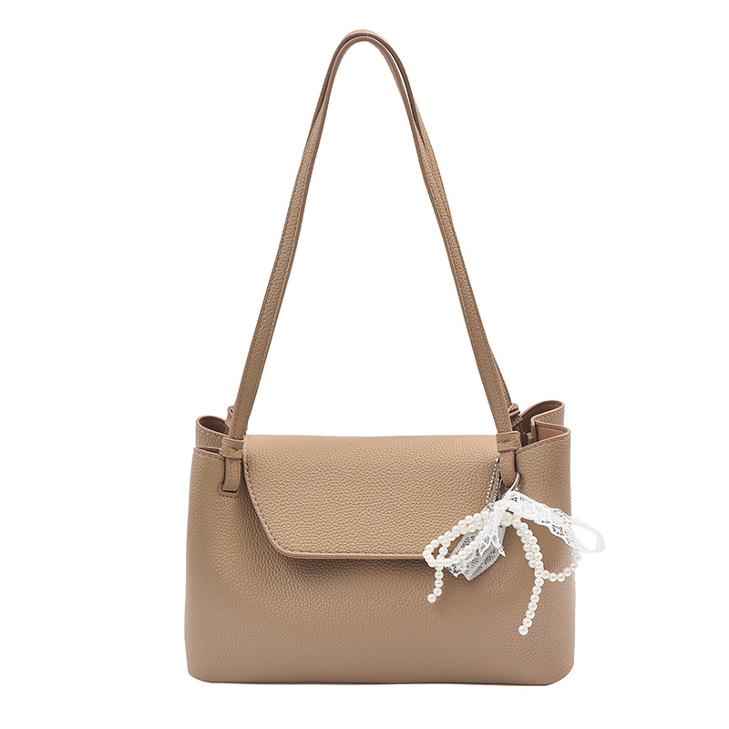 Bolso Tote de cercanías todo-fósforo de nicho retro transfronterizo para mujer 2025 primavera nuevo estilo estilo occidental bolso de axila de un solo hombro de gran capacidad