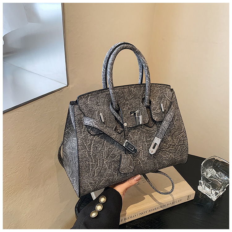 Bolso de platino simple retro ventas calientes de mujeres nuevas moda transfronterizas de alta calidad Kelly bolso de hombro de gran capacidad