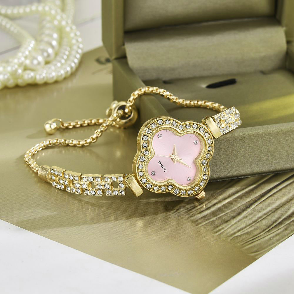 Reloj de pulsera de trébol de cuatro hojas para mujer con incrustaciones de diamantes, lujo ligero, nicho, temperamento de moda de alta gama, exquisito nuevo estilo, pulsera para mujer, reloj para mujer