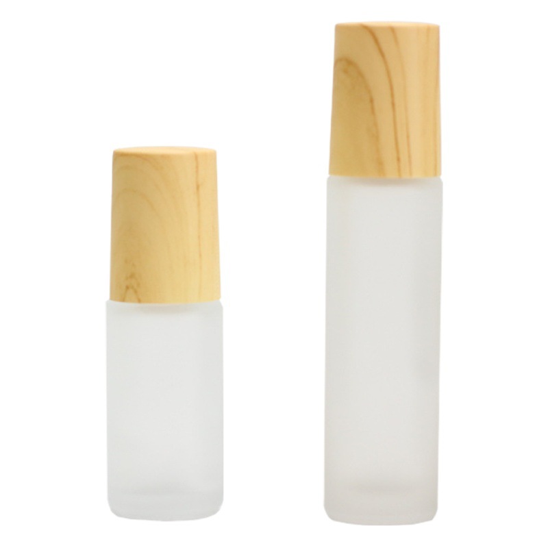 Venta al por mayor 5ml10ml grano de madera cubierta rodillo bola botella de cuentas de vidrio esmerilado Perfume Aceite Esencial bola sub-botella