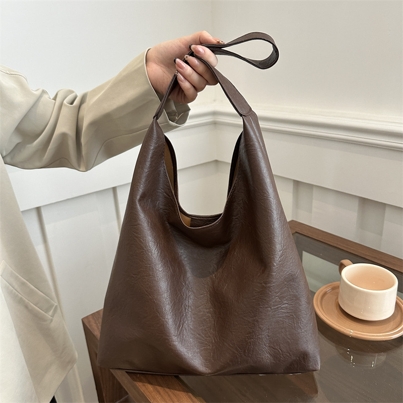 Textura de piel de aceite de gran capacidad perezosa de viento suave de color sólido retro invierno ocio viaje de la axila bolso de hombro