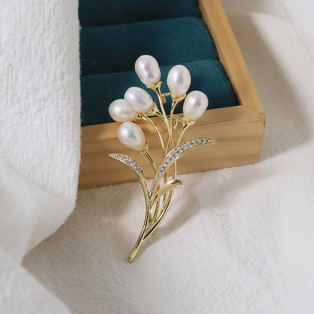 Nuevo globo original broche de perla de trigo de alta calidad nicho de diseño femenino broche coreano ligero de lujo pecho de moda