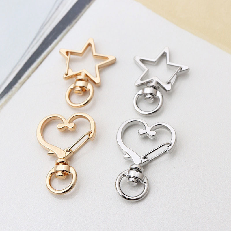 Factory direct shaped keychain metal cat dolphin love five-pointed star cherry blossom shell jewelry accessories diy
