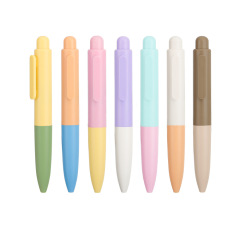 学生のポケットのペンのミニは色のマカロンの中性のペンをつづり合わせます。