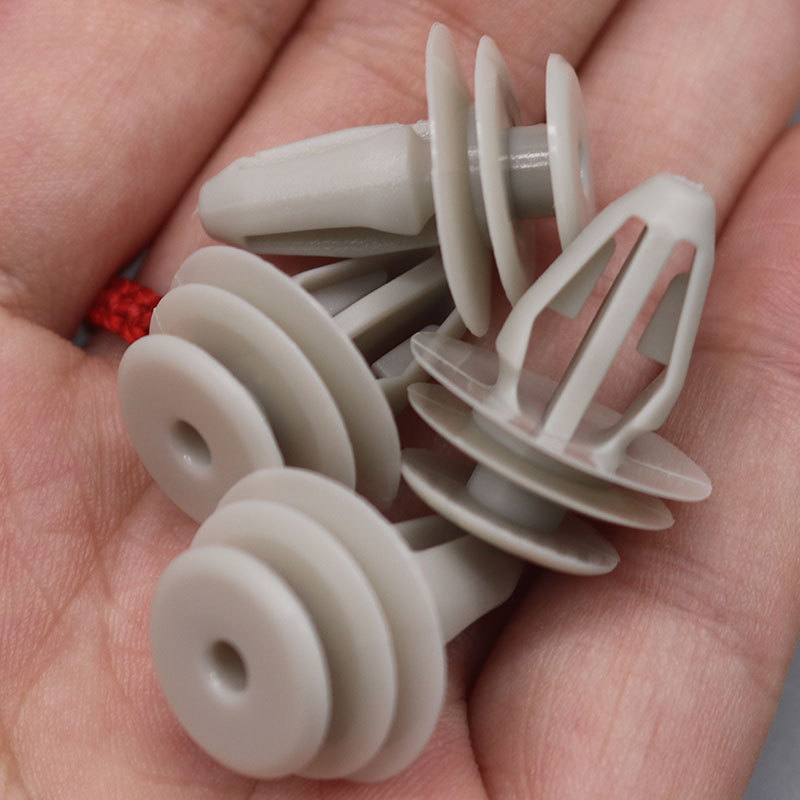 Para roew panel de la puerta del coche decoración interior tronco parachoques hebilla D180 OE:7956821000