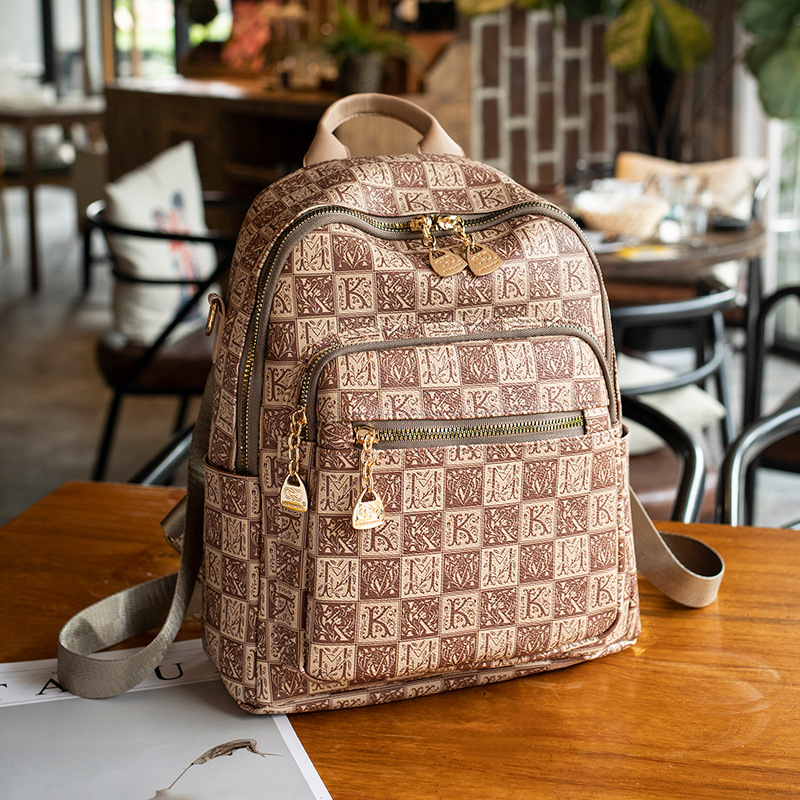 Ins celebridad de Internet mochila femenina 2024 nueva moda salvaje damas mochila de cuero suave mochila de viaje de ocio al aire libre