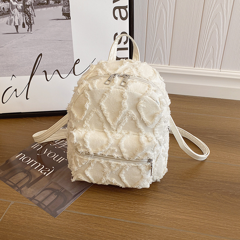 Otoño e Invierno nueva moda bolso de hombro de mezclilla diseño de nicho bolso cruzado mochila personalizada de transporte múltiple